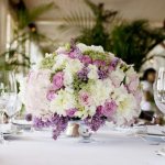 Bouquet with artificial flowers on the festive table