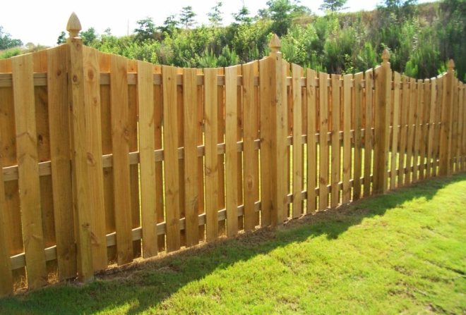 Wooden caps for the fence