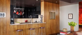 Дизайн просторной кухни с ламинатом на стене