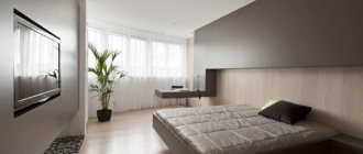 Brown furniture in the interior of a bedroom of 18 sq m