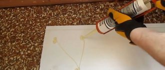 gluing panels to the wall