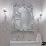 Mirror in a carved white frame